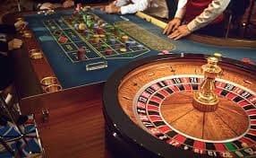 Close-up of slot game paytable and bonus feature symbols on superwin